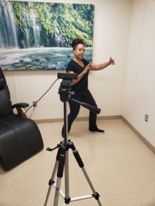 woman standing stretching