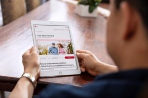 Man using tablet on medical website